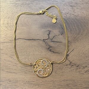 Gold Pendant Necklace with Swirl Design